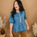 All In Denim Front Bow Peplum Top - Lace and Grace Boutique