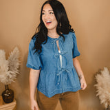 All In Denim Front Bow Peplum Top - Lace and Grace Boutique