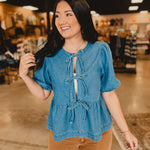 All In Denim Front Bow Peplum Top - Lace and Grace Boutique