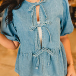 All In Denim Front Bow Peplum Top - Lace and Grace Boutique